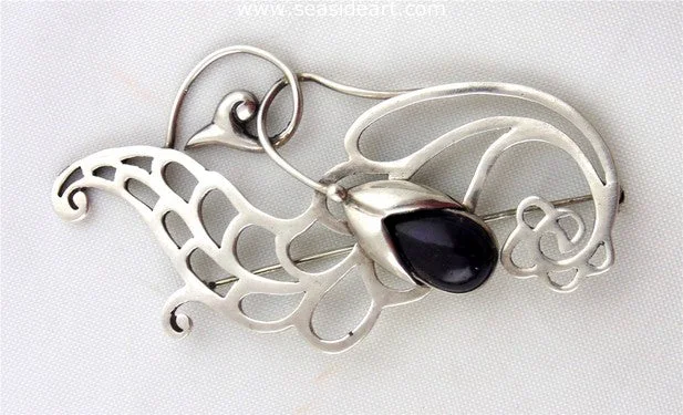 Sterling Silver Floral Brooch with Amethyst by Margot de Taxco